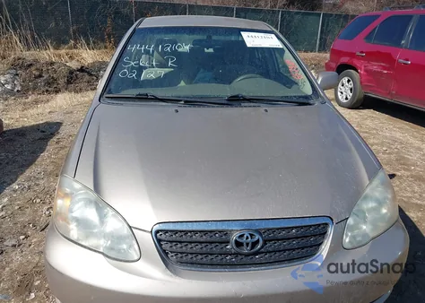 2005 Toyota Corolla Le z USA, uszkodzony, nr VIN 2T1BR32E75C557929